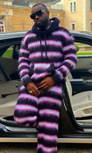 Gims wearing Marni pants