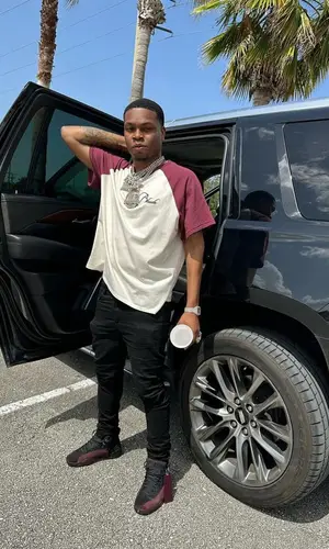 Kenny Muney wearing Amiri jeans
