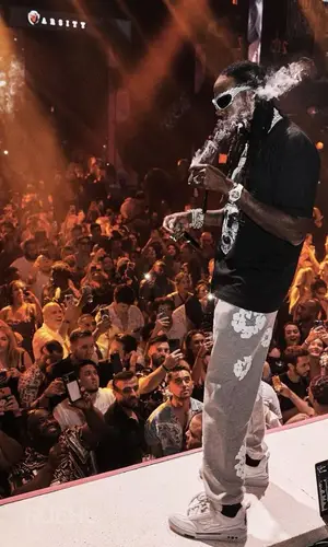 2 Chainz wearing Denim Tears pants
