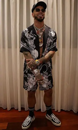Anuel AA wearing Amiri shirt