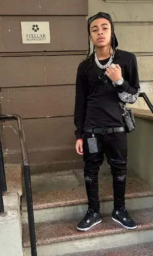 DD Osama wearing Chrome Hearts sweatshirt