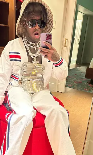 Lil Uzi Vert wearing Gucci trousers