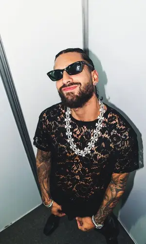 Maluma’s Outfit in Valentino T-Shirt, Saint Laurent Trousers & Ray-Ban Eyewear (2023)