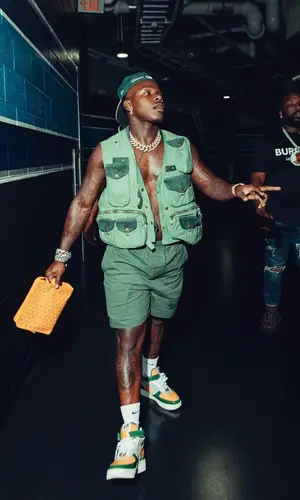 DaBaby wearing Goyard bag
