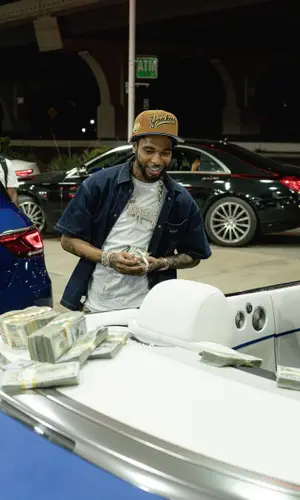 Key Glock wearing Prada shirt