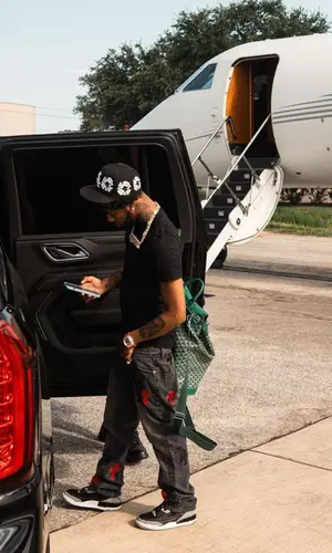 Key Glock wearing Goyard backpack
