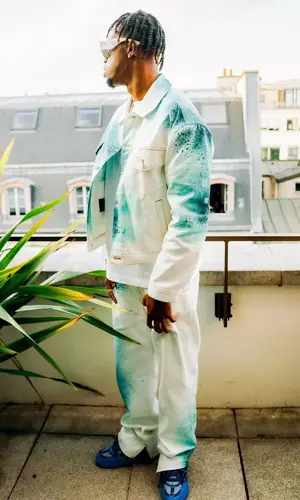 Carney Chukwuemeka wearing Louis Vuitton sneakers