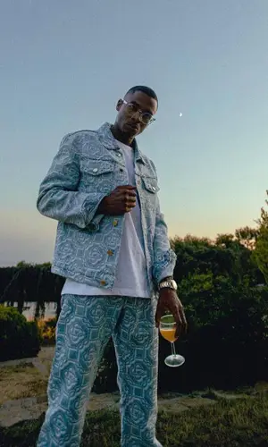 Timal wearing Oliver Peoples eyewear