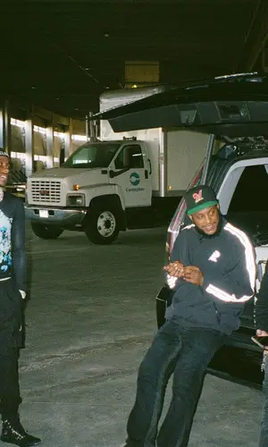 Rich The Kid wearing Kusikohc shirt