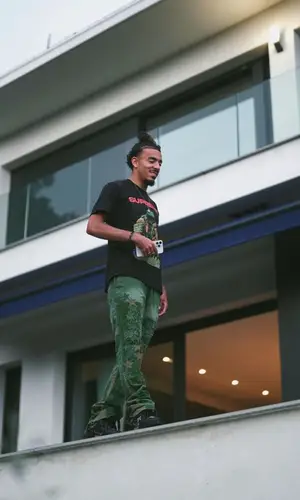 Malo Gusto wearing Louis Vuitton sneakers