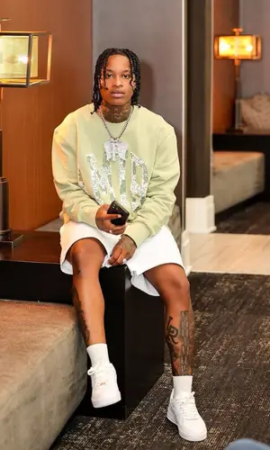 Lil Perfect wearing Amiri sweatshirt