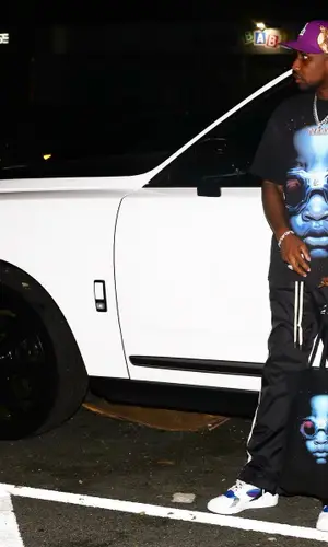 Fabolous wearing Jon Stan cap