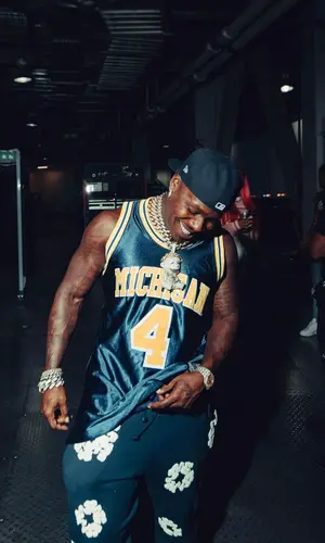 DaBaby wearing Mitchell & Ness jersey