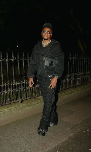 Leon Bailey wearing Louis Vuitton belt