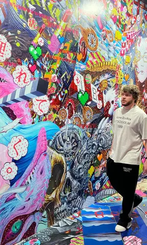 Murda Beatz’s Outfit in Acne Studios T-Shirt, Gallery Dept. Pants & Louis Vuitton Sneakers (2023)
