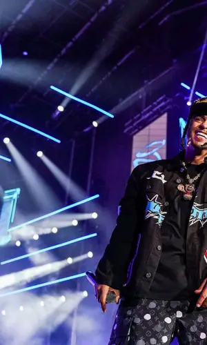 Ozuna wearing Louis Vuitton cap