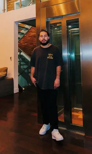 Arsn wearing Gallery Dept. t-shirt