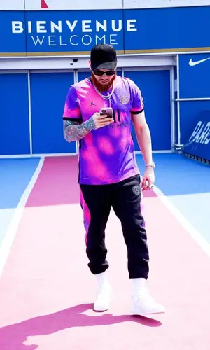 Miky Woodz wearing Jordan pants