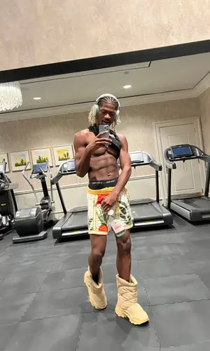 Lil Nas X’s Outfit in Nike Shorts, Yeezy Boots & Calvin Klein Underwear (2023)