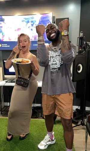 Davido wearing Dior sneakers