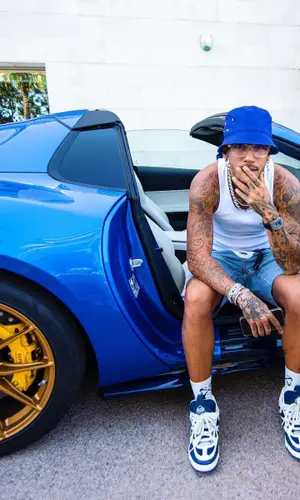 Sfera Ebbasta’s Outfit in IceCream Jeans, Chrome Hearts Eyewear & Bottega Veneta Hat (2023)
