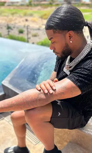 CJ So Cool wearing Amiri sandal