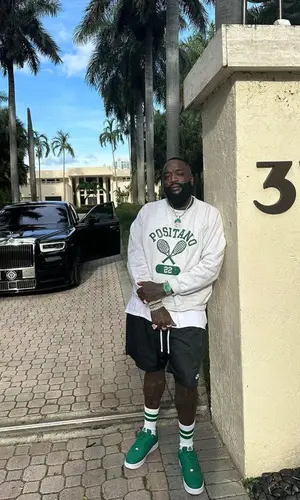 Rick Ross wearing Nike shorts