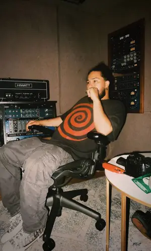 Arsn wearing H&M pants