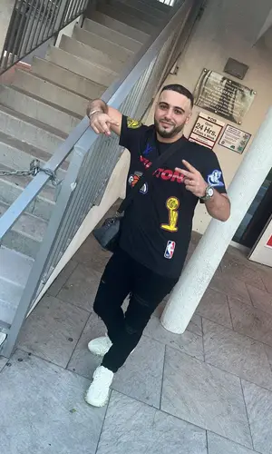 DjaDja wearing Louis Vuitton bag