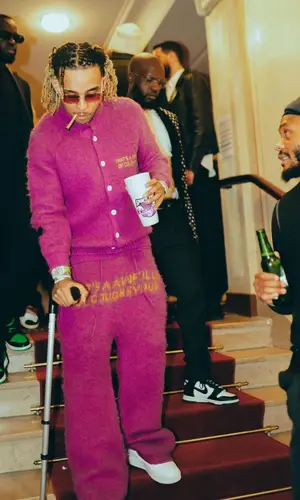 Zola wearing Awful Lot of Cough Syrup jacket