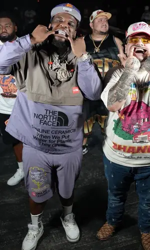 Maxo Kream wearing The North Face shorts