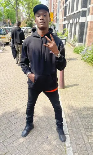 Mig wearing Amiri jeans