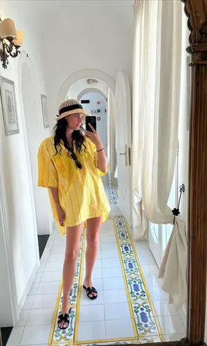 Sara Sampaio’s Outfit in Etro Shirt, Prada Eyewear & Hermes Sandals (2023)