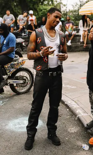 A Boogie Wit Da Hoodie wearing Chrome Hearts boots