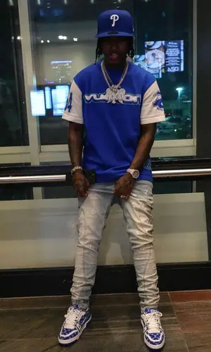 Lil Perfect’s Outfit in Louis Vuitton T-Shirt, Serenede Jeans & New Era Cap (2023)