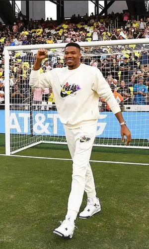 Giannis Antetokounmpo wearing Nike sweatshirt