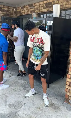 Stunna 4 Vegas wearing Supreme sock