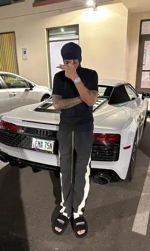 Tekno wearing Rhude pants