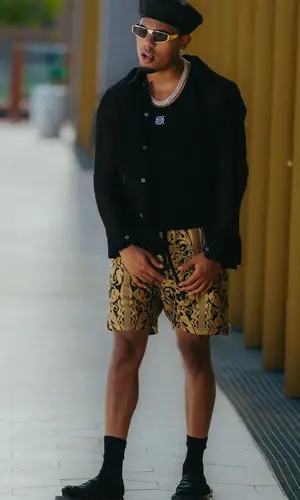 Myke Towers wearing Bottega Veneta sandal