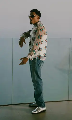 Myke Towers wearing Sebago sandal