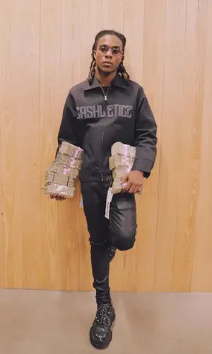Cae Cartier wearing Purple Brand jeans