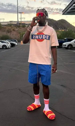 Sauce Walka’s Outfit in Rhude T-Shirt, Oakley Eyewear & Marni Sandals (2023)