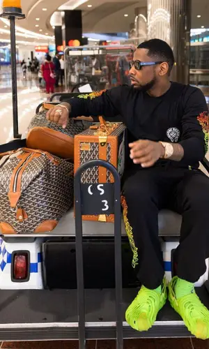 Fabolous wearing Goyard backpack