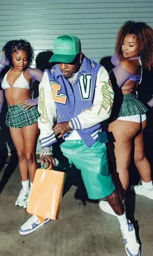 DaBaby wearing Louis Vuitton jacket