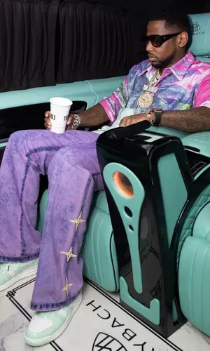 Fabolous wearing Who Decides War shirt