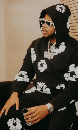K-Trap wearing Denim Tears pants