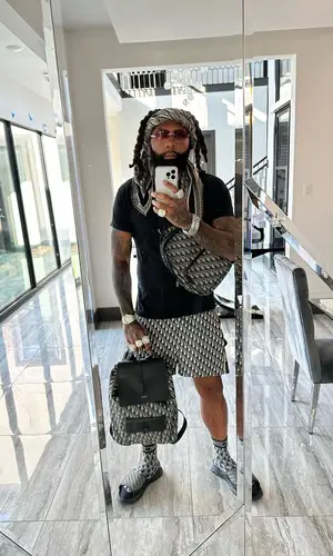 Money Man wearing Dior shorts