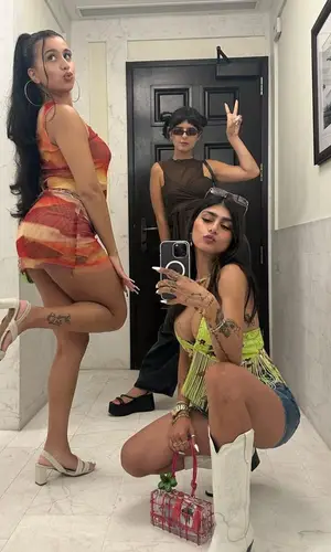 Mia Khalifa’s Outfit in Diesel Shorts, Paris Texas Boots & Cult Gaia Bag (2023)