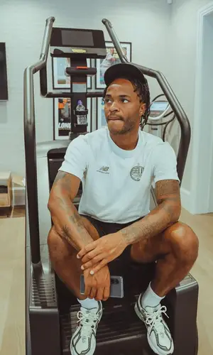 Raheem Sterling wearing New Balance sneakers