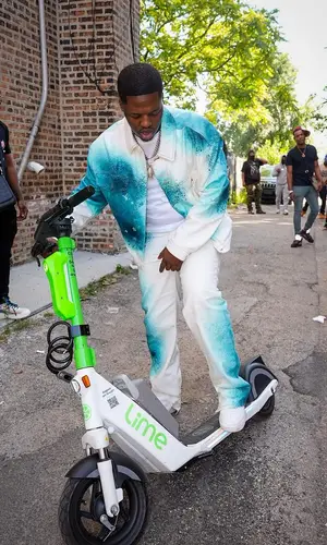 Lil Zay Osama’s Outfit in Louis Vuitton Jacket & Nike Sneakers (2023)